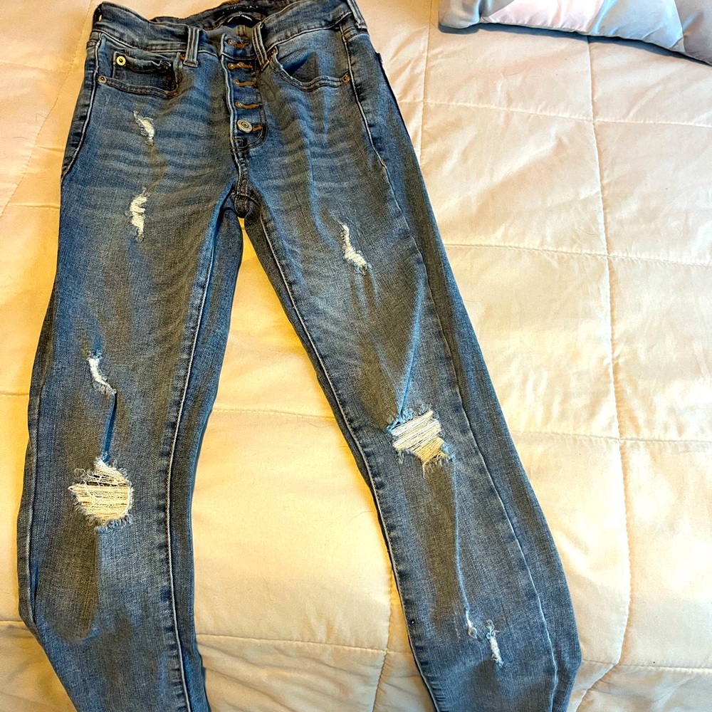 Ripped skinny high rise jeggings